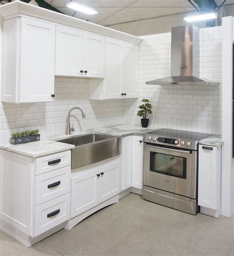 white kitchen cabinets with stainless steel farmhouse sink|white cabinet farmhouse kitchen backsplash.